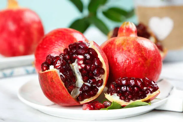 Pomegranate Plant And Seeds